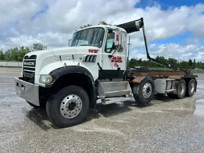 Engine Model: MP8, HP: 425, ENGINE CONFORMS TO 2013 U.S. EPA, Transmission: A/T, Dbl Diff Lock, Susp...