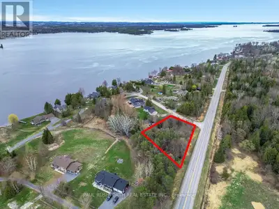 SPECTACULAR!! The perfect lot to build your custom dream home.WELL TREED. The lot is ready for the D...