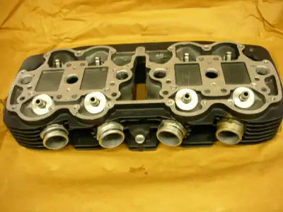 Have a NOS OEM Honda Cylinder head fits 1077 and 78 CB 750 F model comes with one cam holder can be...