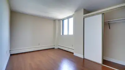 Enjoy generous living space in this unique two-level 2 bedroom plus den suite at South Tower. Locate...