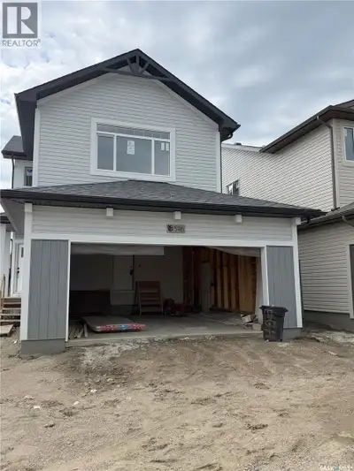 Ehrenburg built home in Brighton. "HOLDENDERG MODEL ... 1699 sq.ft. - 2 storey. LEGAL SUITE OPTION....