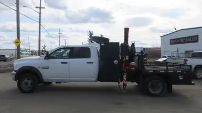 2015 RAM 5500HD CREW CAB WITH FASSI F65A BOOM PICKER CRANE TRUCK AMVIC Licensed Dealership Financing...