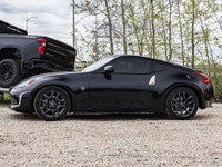 This Nissan 370Z is a sleek and sporty coupe designed for drivers who appreciate performance, style,... (image 4)