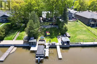 Welcome to 1416 River Road West. Experience waterfront living at its finest. Situated along one of t...
