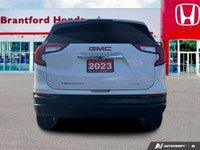 Elevate your daily drives with this impressive white 2023 GMC Terrain SLE Sport Utility, showing jus... (image 4)