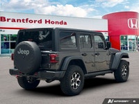 Designed to conquer both rugged trails and urban landscapes, this 2021 Jeep Wrangler Unlimited Rubic... (image 6)