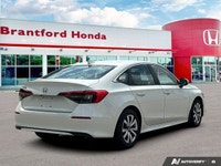 Drive with confidence and sophistication in this immaculate white 2022 Honda Civic Sedan LX. Experie... (image 6)