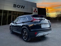 The 2024 Mitsubishi Eclipse Cross in a striking black finish is designed to tackle any road with its... (image 4)