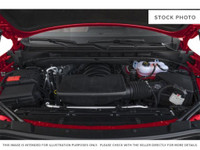 The 2026 GMC Yukon 4WD AT4 Ultimate in striking Onyx Black with Obsidian Rush interior and red accen... (image 7)