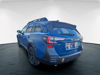 The 2022 Subaru Outback Wilderness in a striking blue finish with an all-wheel-drive system is your... (image 7)