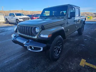 For a quick response please text 403-820-9940. AMVIC licensed business The 2026 Jeep Gladiator Sport...