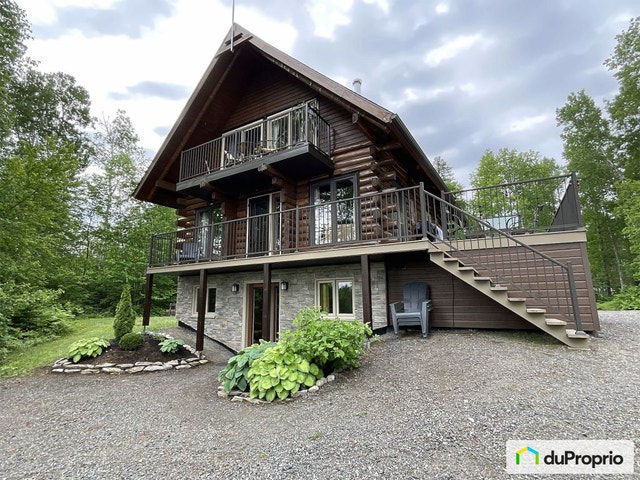 $505,000 - Cottage for sale in Lamarche — photo 1
