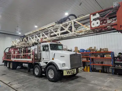 RIG #18 2001 Kenworth T800 with Ingersoll-Rand TH60 drilling rig KMS 26,640 HRS 18,296 Mast Height:...