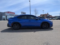 The pre-owned 2023 Subaru WRX Sport-Tech in WR Blue Pearl with a Black Alcantara interior delivers e... (image 7)