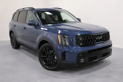 The 2025 Kia Telluride X-Line in an elegant Blue finish is a captivating AWD SUV designed to conquer...