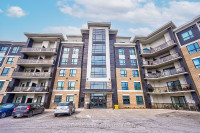 RARELY OFFERED 1 BR Ground Floor Condo Unit With Private Views!