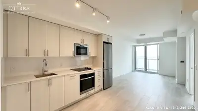 MODERN 1+DEN CONDO WITH BEAUTIFUL CITY VIEWS