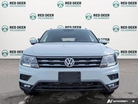 The pre-owned 2021 Volkswagen Tiguan Comfortline is a versatile and well-equipped SUV designed for d... (image 2)