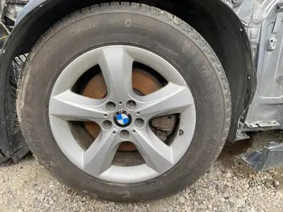 Set of four 255/55R18 winter tires mounted on 18x8.5" BMW wheels. Removed from a 2011 BMW X5. Please...