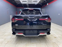 The 2023 Hyundai Santa Cruz Preferred AWD in sleek black offers an extraordinary driving experience... (image 4)