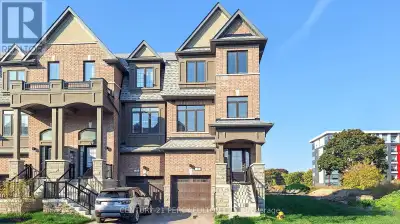 This stunning BRAND NEW END UNIT Regent model on a 28 Ft wide fenced lot Siding onto the Park to be...