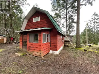 Escape to nature on easy going Mudge Island. Enjoy this cozy 2 bedroom cabin, built by hand by the o...