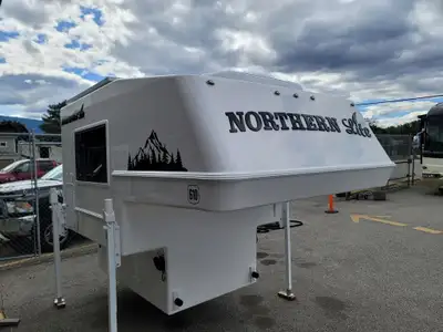 The original Northern Lite 610 truck camper, considered a cult classic by truck camper aficionados,...