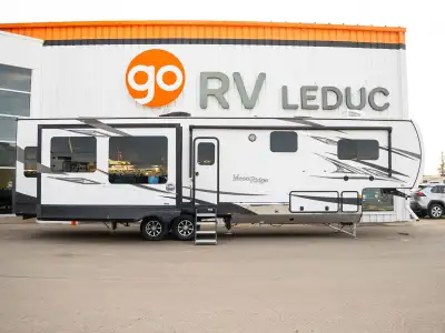 A spacious RV with a comfortable residential-style feel, generous living space, and a layout suited...