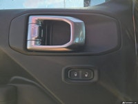 This Jeep Wrangler has a strong Regular Unleaded V-6 3.6 L/220 engine powering this Manual transmiss... (image 9)