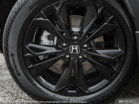 Meet the 2023 Honda CR-V Hybrid Touring, a white AWD SUV designed for exceptional handling and perfo... (image 6)