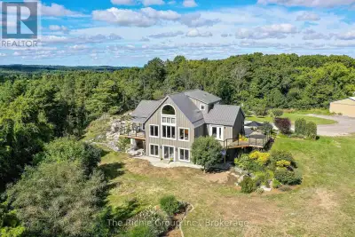 Set on 50 acres of tiered land with the residence perfectly positioned on a natural plateau, this Ho...