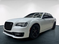 The 2023 Chrysler 300, particularly the 300C RWD in pristine white, is a powerful sedan that truly s... (image 9)
