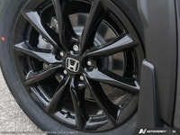 The 2026 Honda CR-V Hybrid EX-L in a stunning Blue finish with AWD handling offers an optimal drivin... (image 7)