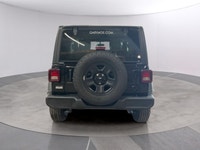 Get ready to explore the great outdoors with the 2026 Jeep Wrangler Sport 2 Door 4x4, stunningly dre... (image 3)