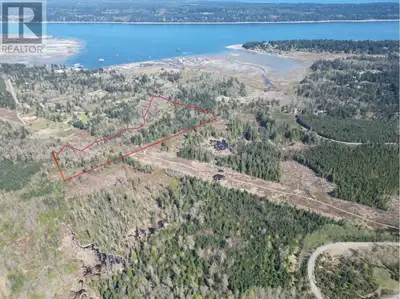 Over 37 Acres in Fanny Bay BC - NOT in the ALR! Discover a beautiful and private setting with legal...