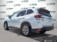 The pre-owned *2021 Subaru Forester Touring* is a versatile SUV built for drivers who value safety,... (image 4)