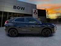 The 2025 Mitsubishi Eclipse Cross NOIR S-AWC in a striking Black hue offers a 4x4 drivetrain that pr... (image 3)
