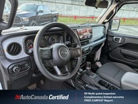 The 2024 Jeep Wrangler Sport in brilliant Bright White, with a mere 33,121 kilometers, is your ticke... (image 9)