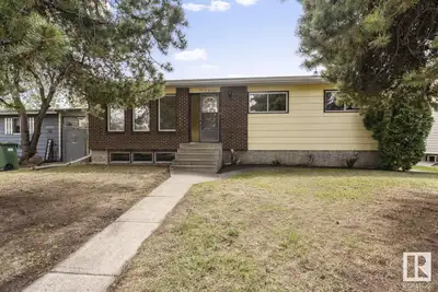 Inviting family home that exudes warmth and comfort! Bright and airy living room with hardwood floor...