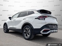 Experience the practicality and reliability of a 2023 Kia Sportage LX, boasting a sleek white exteri... (image 3)