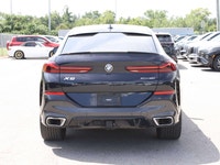 Experience distinctive styling, premium luxury, and impressive performance with this 2021 BMW X6 xDr... (image 4)