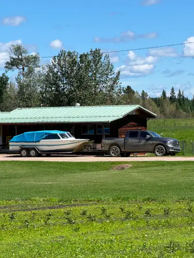1995 Jetman River boat for sale. Built in Rocky Mountain House by Brian Clement. 21 feet, 350 Kodiak...