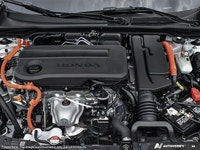 The 2026 Honda Civic Sedan Hybrid Sport Touring features an integrated navigation system to guide ev... (image 5)