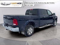 Experience the robust power and commanding presence of the 2012 Ram 3500 Laramie with its stunning d... (image 2)