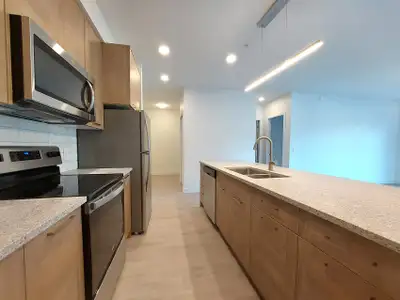 Bright 2 bedroom + den includes parking, A/C, gym. CALL 778-533-7326 This West facing 2 bedroom + 1...