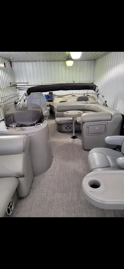 double bimini top, livewell, bbq, change room, stereo, extended swim platform, triple tube with hydr...