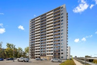 Fully renovated spacious suite features kitchen with modern features and finishes including laminate... (image 3)