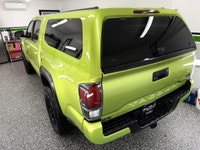 We have a RARE, SUPERCHARGED, ELECTRIC LIME METALLIC 2022 Toyota Tacoma TRD PRO 4x4! This truck look... (image 7)