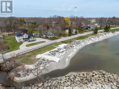 Custom-Built waterfront home-extraordinary comfort by the Lake. Nestled along the shores of Lake Eri...