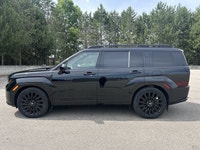 This used 2025 Hyundai Santa Fe Ultimate Calligraphy AWD that blends family-ready space, upscale com... (image 9)